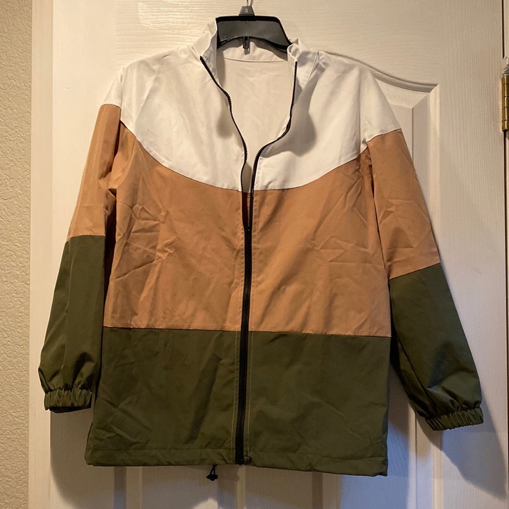 Light weight multi-color Jacket. Hardly worn, great condition. Small